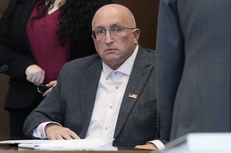 Robert E. Crimo Jr., waits to leave after an appearance at the Lake County Courthouse, Friday, Nov. 3, 2023, in Waukegan, Ill. A judge expected to hold a final pretrial hearing for an Illinois man accused of helping his son obtain a gun license three years before the younger man fatally shot seven people at a 2022 Fourth of July parade in suburban Chicago. (AP Photo/Nam Y. Huh, Pool)