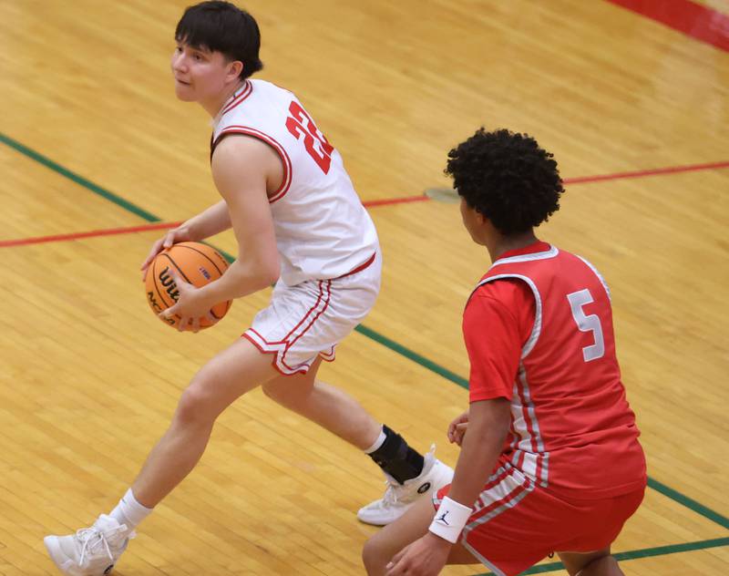 Ottawa's Dominic Parks looks to pass the ball around Streator's Lavontae Horton during the Class 3A Regional semifinal game on Wednesday, Feb. 25, 2026 in Sellett Gymnasium at L-P High School.