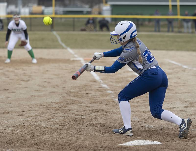 Princeton’s Kelsea Klingenberg pops up a bunt against Rock Falls Thursday, March 23, 2023.