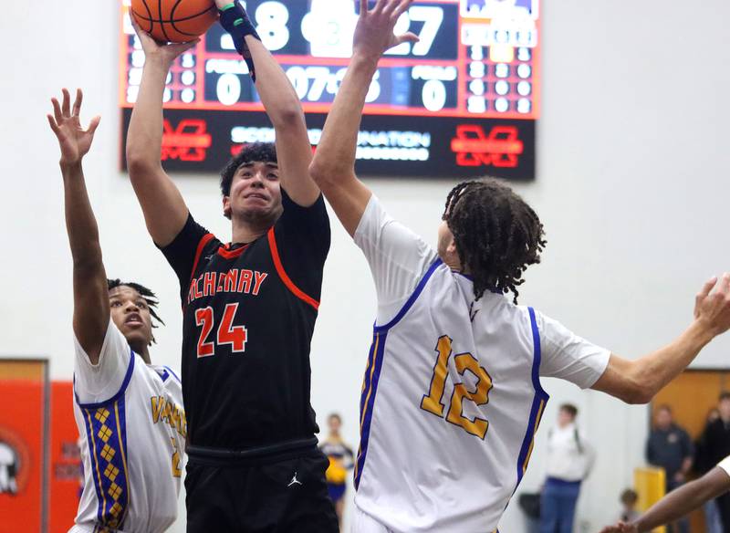 McHenry’s Adam Anwar takes a shot against Warren in IHSA Class 4A Regional Title Game boys basketball action on Friday, Feb. 28, 2025 at McHenry High School in McHenry.