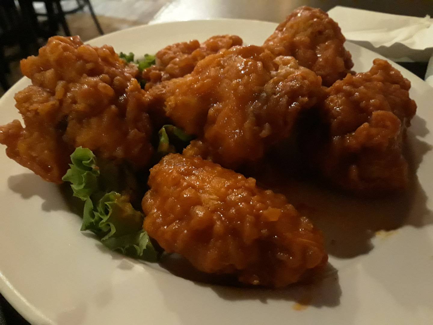 Wingers and football go hand-in-hand. An order of six, breaded chicken wings hot were my preference at Riverfront Bar and Grill in Peru.