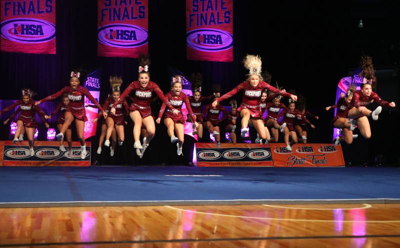 Members of the Lockport cheerleading team perform during the Competitive Cheerleading State Finals on Saturday, Feb. 3, 2024 at Grossinger Motors Arena in Bloomington.