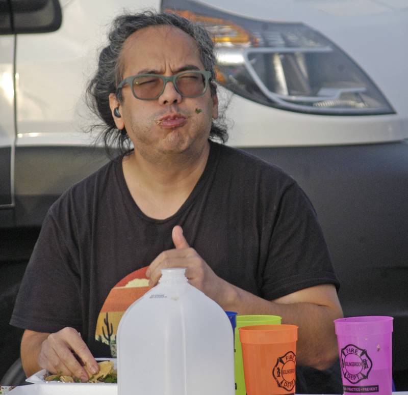 Eventual taco eating  contest winner  Teddy DeLaCruz of Wood Dale gives a thumbs up at the Taco Throwdown Events Sponsored by Rock Falls Tourism. Event at RB&W District September 27th, 2024.
