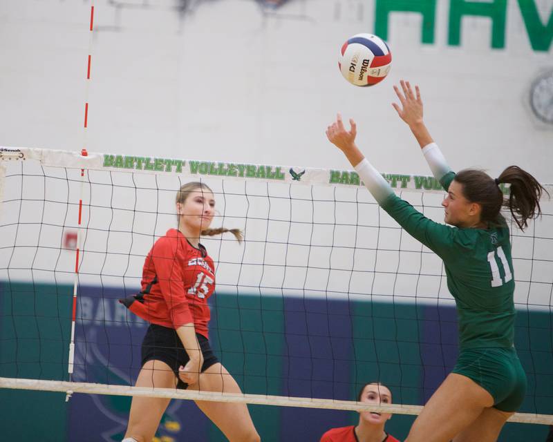 Benet's Sophia Chinetti sends a kill shot past New Trier at the Class 4A Super Sectional Final on Friday, Nov.3,2023 in Bartlett.