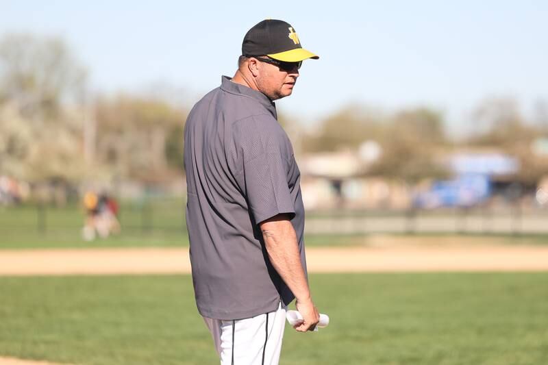 Joliet West head coach John Karczewski stands at third against Joliet Central on Monday, April 15, 2024.