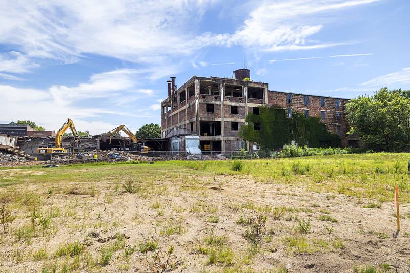 Demolition on the former Micro Industries continues Wednesday, Aug. 7, 2024 in Rock Falls. Crews from McDonagh Demolition started the project earlier this week.