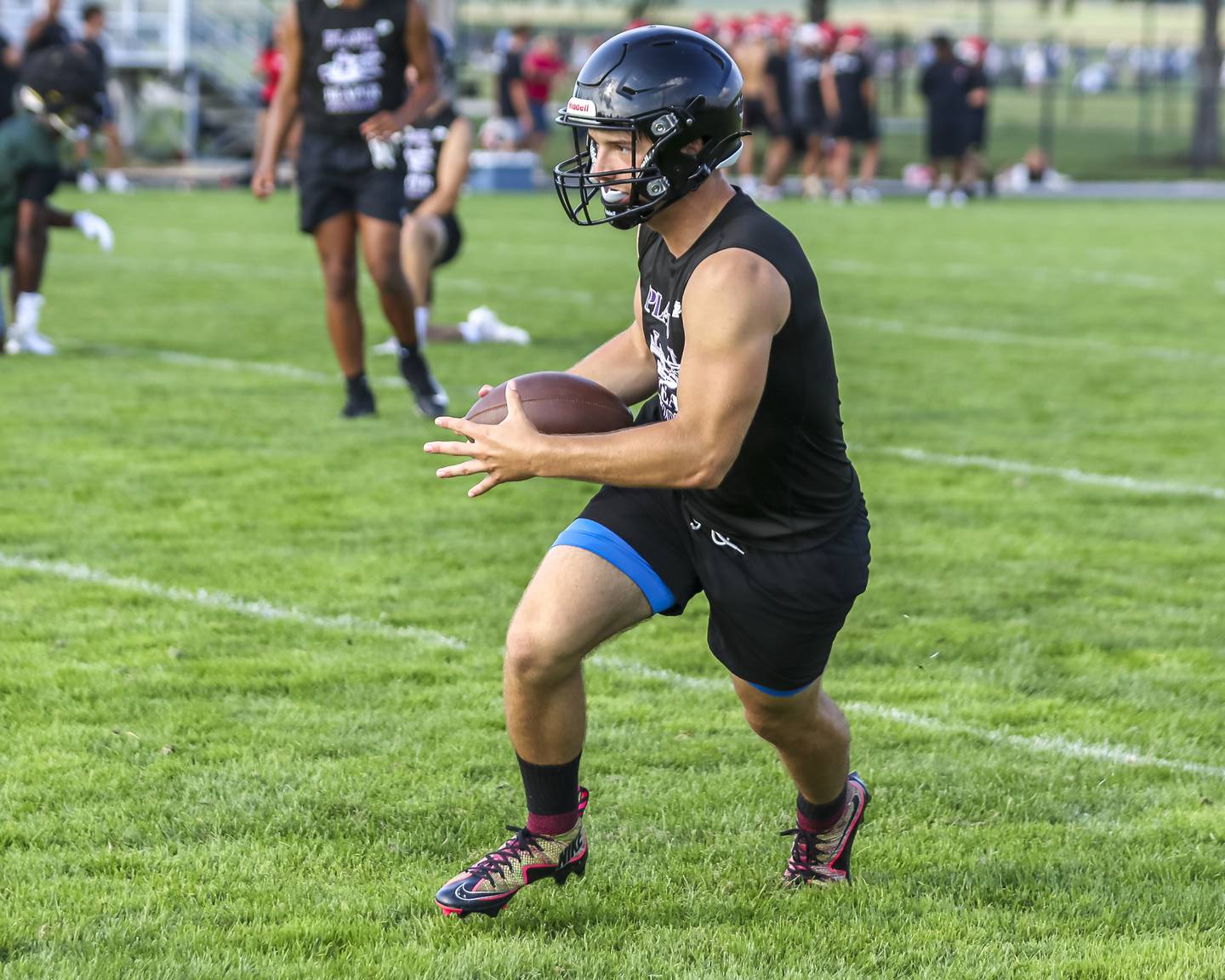 Plano's Kolton Schimandle runs after a catch during the Kaneland 7 on 7 football tournament, July 22, 2025 in Maple Park.