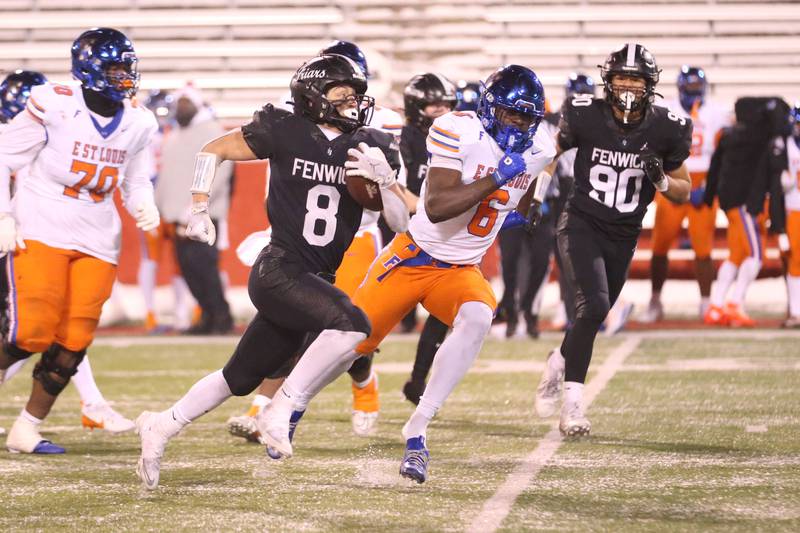 Fenwick's Jake Thies runs the ball against East St. Louis during the Class 6A State championship game on Tuesday, Dec. 2, 2025 in Hancock Stadium at Illinois State University in Normal.