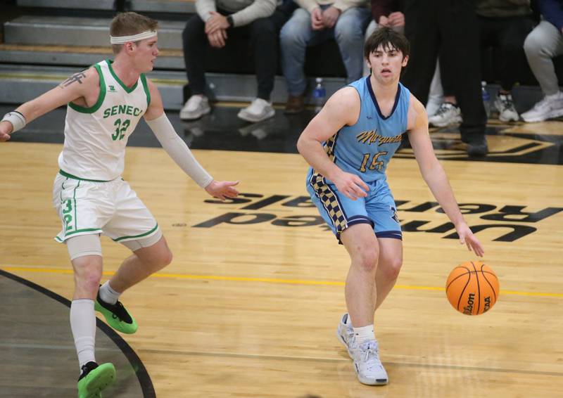 Marquette's Alex Novotney looks to pass the ball around Seneca's Paxton Giertz during the Tri-County Conference championship on Friday, Jan. 31, 2025 at Putnam County High School.