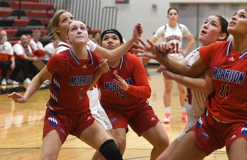 Morrison's Sophie Damhoff (1), Ashley Alba (15), and Elaine Gallegos (11) box out Forreston's Alice Kobler and Eva Hundertmark on Friday, Nov. 21, 2025 at the Forreston High School Girls Basketball Thanksgiving Tournament.