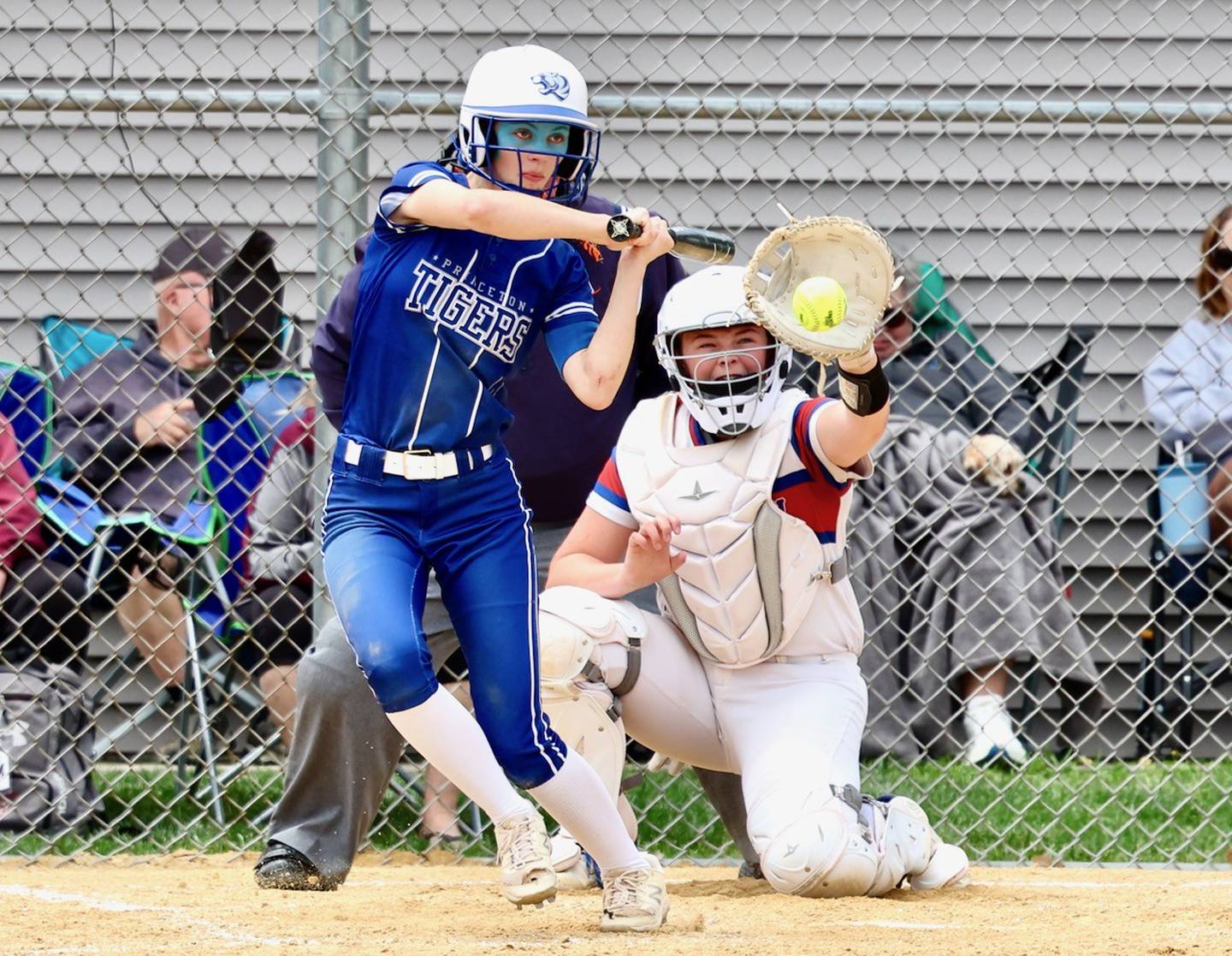 Princeton's Caroline Keutzer slaps a hit in Saturday's regional championship at Princeton. Morrison won 9-0.