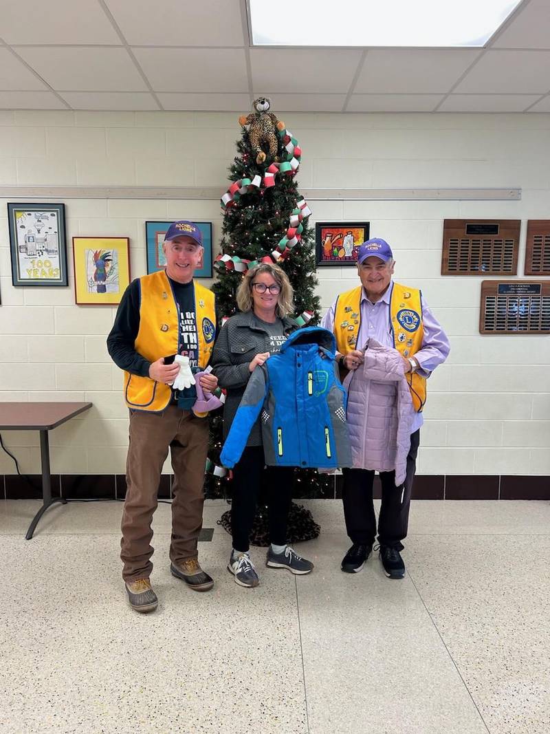 The Rochelle Lions Club recently donated new winter coats, hats and gloves to Lincoln Elementary school. Pictured from left to right are: Lion Rick Cogswell, District 231 Counselor Erin Strouss and Lion Kevin Zilm.