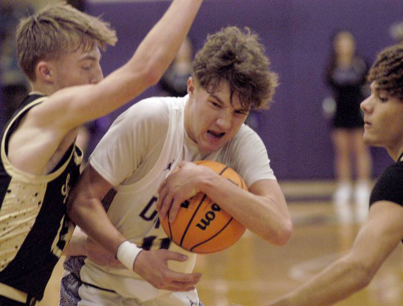 Dixon's Brody Nicklaus fights for the balll. The Dixon Dukes hosted  the Sycamore Spartans in a non-conference game  on Friday, December 19th, 2025.