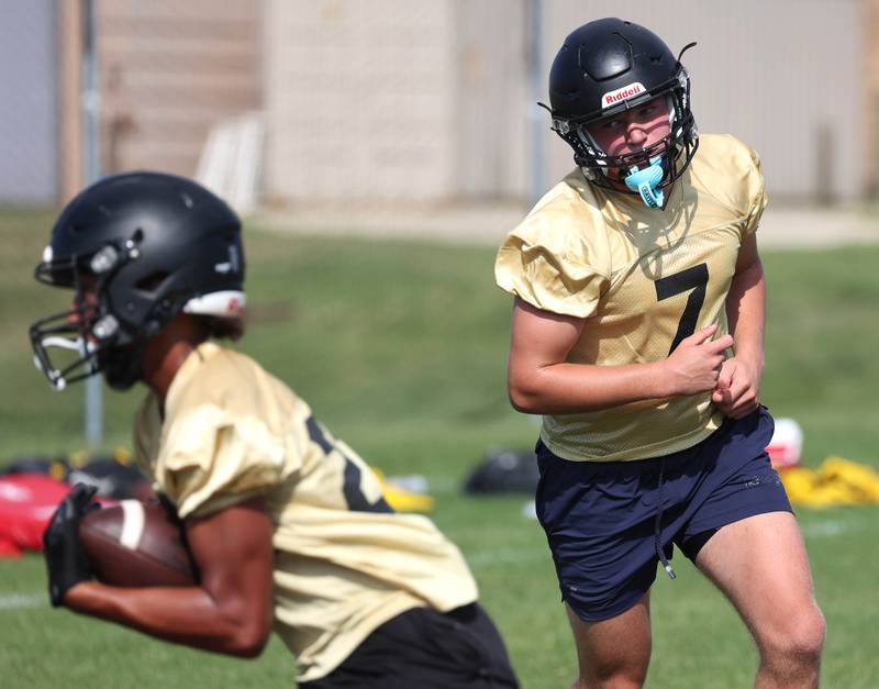 Sycamore’s Cooper Bode takes part in a drill Monday, Aug. 11, 2025, during their first fall practice at the school.