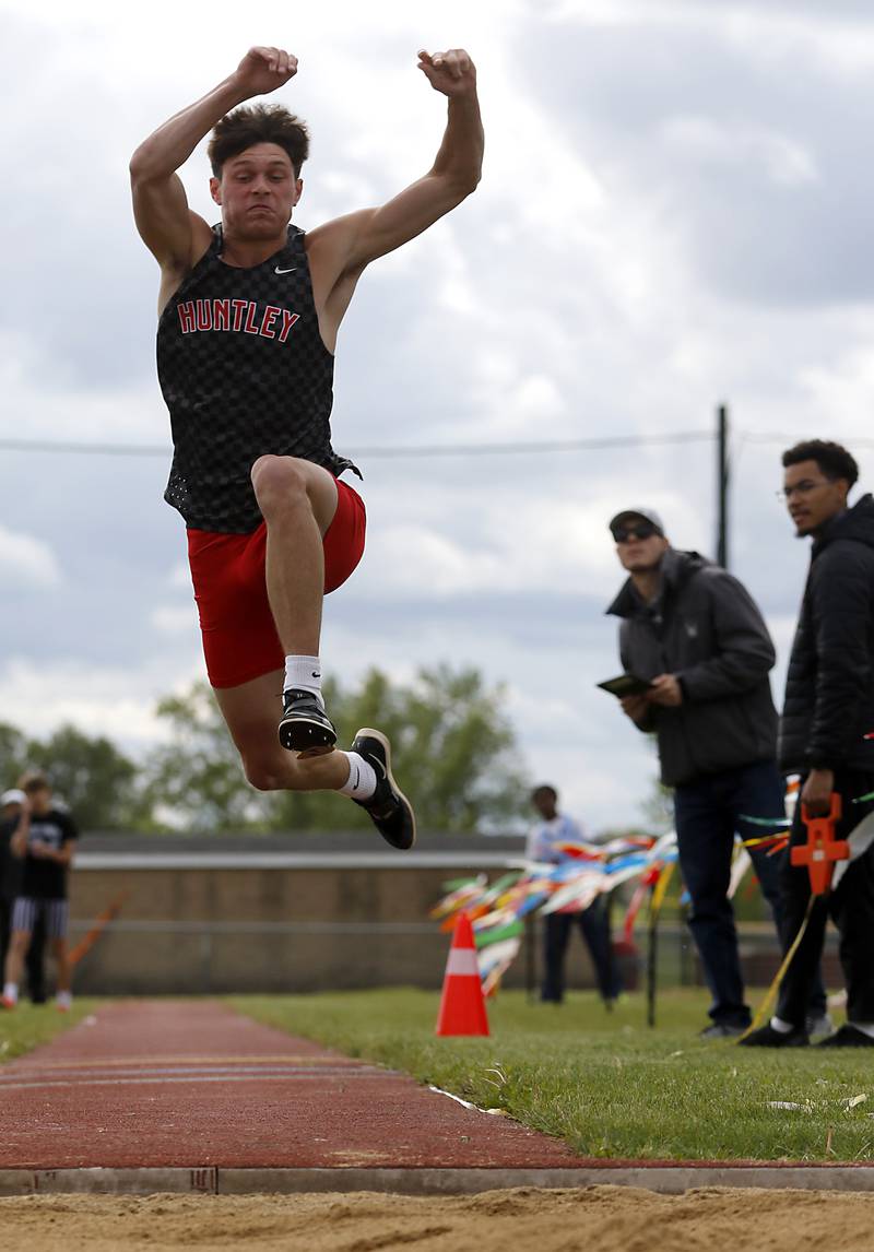 Huntley’s Zach Rysavy competes in the triple jump during the Huntley IHSA Class 3A Boys Sectional Track and Field Meet on Thursday, May 22, 2025, at Huntley High School.