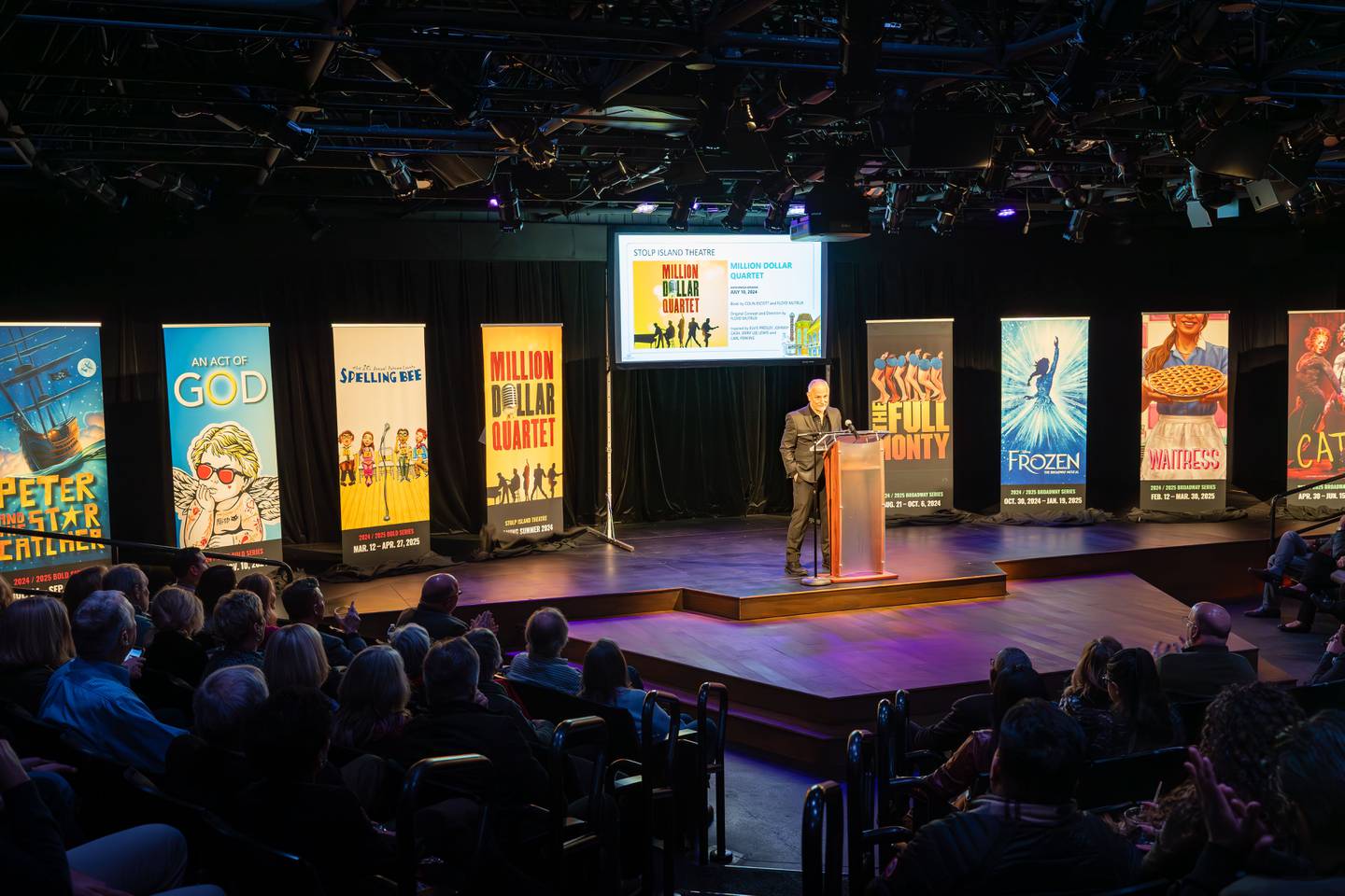 SCENE-Paramount-NewSeasonNewTheater-Jim Corti with 2024-25 show banners_credit Amy Nelson.jpg