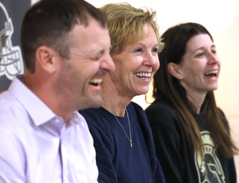 Dan Wheeler, (left) a fifth grade teacher, Deb Wheeler, a paraprofessional, and 	
Whitney Wheeler, (right) a third grade teacher,  who all work at South Prairie Elementary School in Sycamore, have a laugh as they talk Friday, April, 11, 2025, at the school, about the benefits and enjoyment that comes from working together in the same building.
