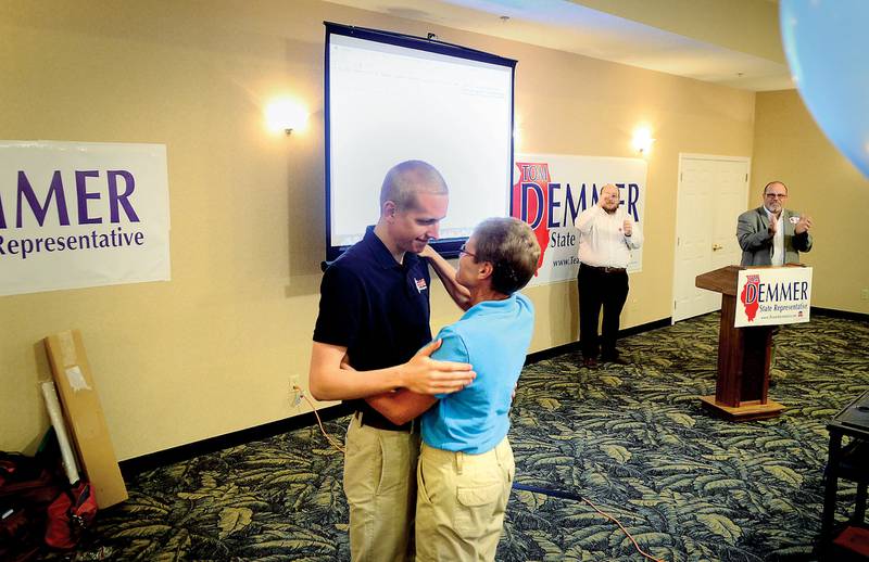 Tom Demmer is hugged by his mom after winning the 90th District Republican primary March 20, 2012.