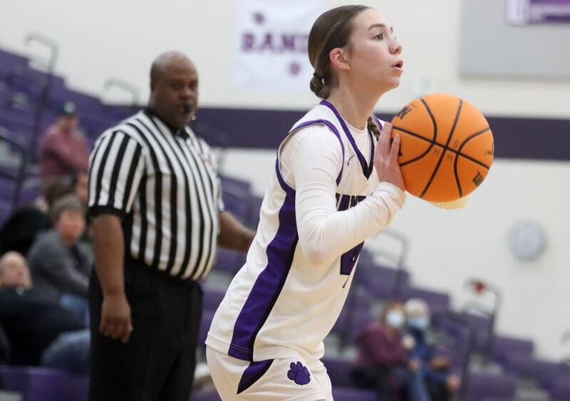 Hampshire’s Peyton McCarthy takes an outside shot against Sycamore in varsity girls basketball on Friday, Jan. 3, 2025, at Hampshire High School in Hampshire.