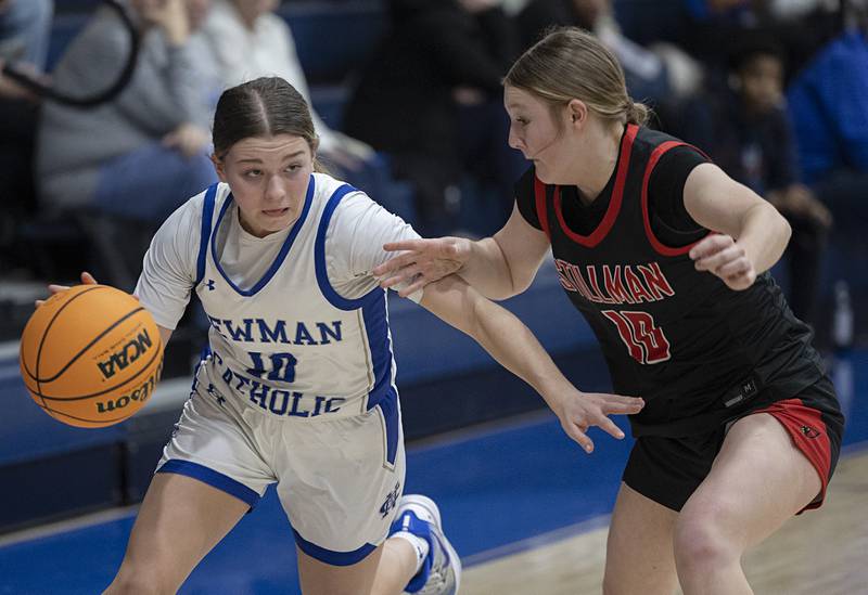 Newman’s Elaina Allen handles the ball against Stillman Valley’s Sydney Musial Monday, Feb. 2, 2026.