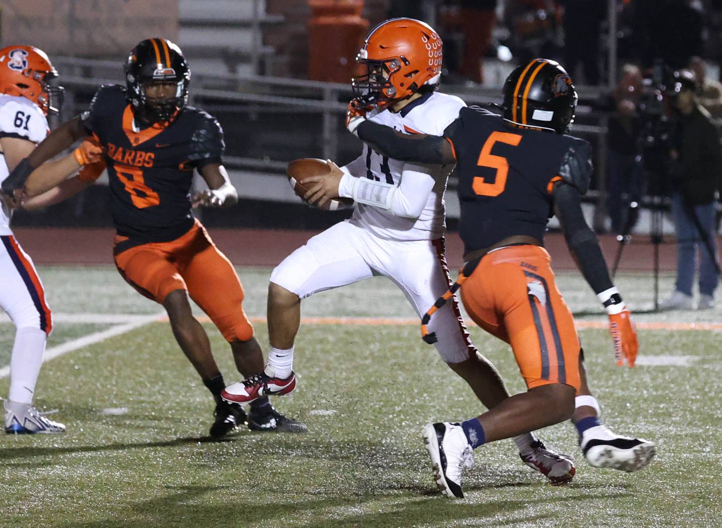 DeKalb's Pierre Cathina pressures the Stagg quarterback during their game Friday, Oct. 25, 2024, at DeKalb High School.