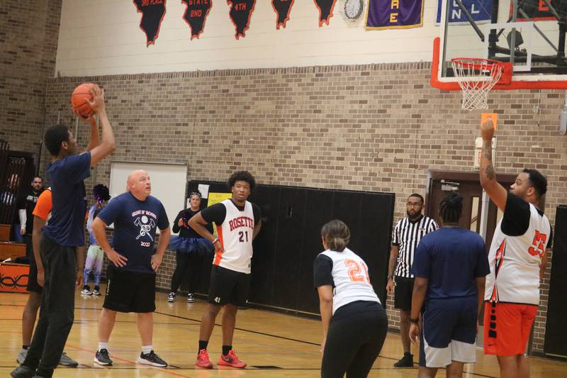 Landen Gadney shoots and scores at the charity stripe Dec. 4, 2023 during the Guns and Hoses Basketball Game put on at Huntley Middle School in DeKalb.