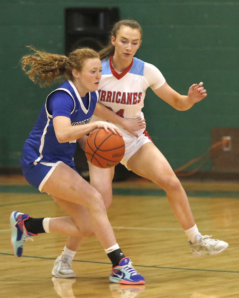 Woodstock's Keira Bogott tries to drive on Marian Central's Juliette Huff during the girl’s game of McHenry County Area All-Star Basketball Extravaganza on Sunday, April 13, 2025, at Alden-Hebron’s Tigard Gymnasium in Hebron.
