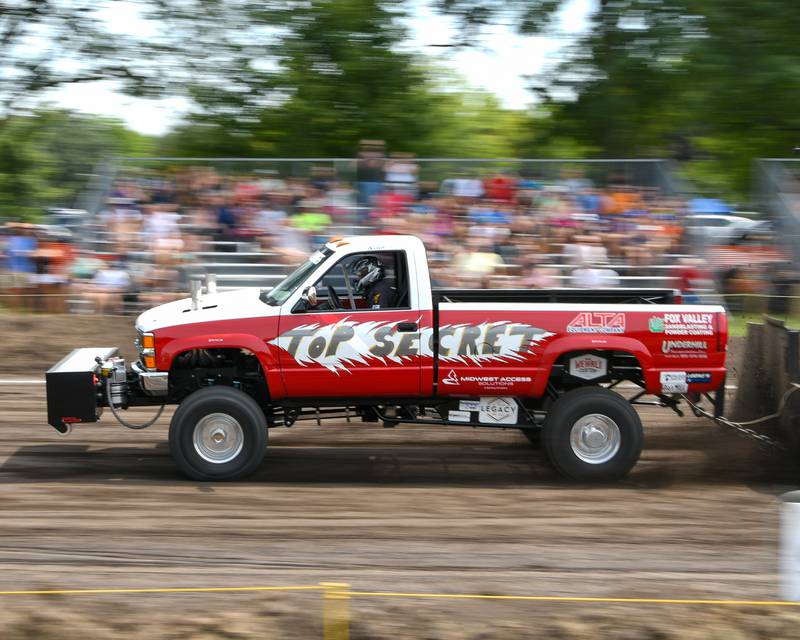 A truck called Top Secret competes in the truck pull on Saturday Aug. 16, 2025, during Elburn Days.