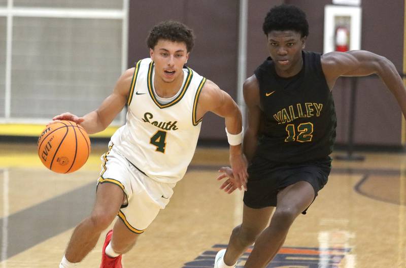 Crystal Lake South’s AJ Demirov, left, races past Waubonsie Valley’s Tyreek Coleman  during Hinkle Holiday Classic varsity boys basketball tournament title game action on Friday, Dec. 27, 2024 at Jacobs High School in Algonquin.