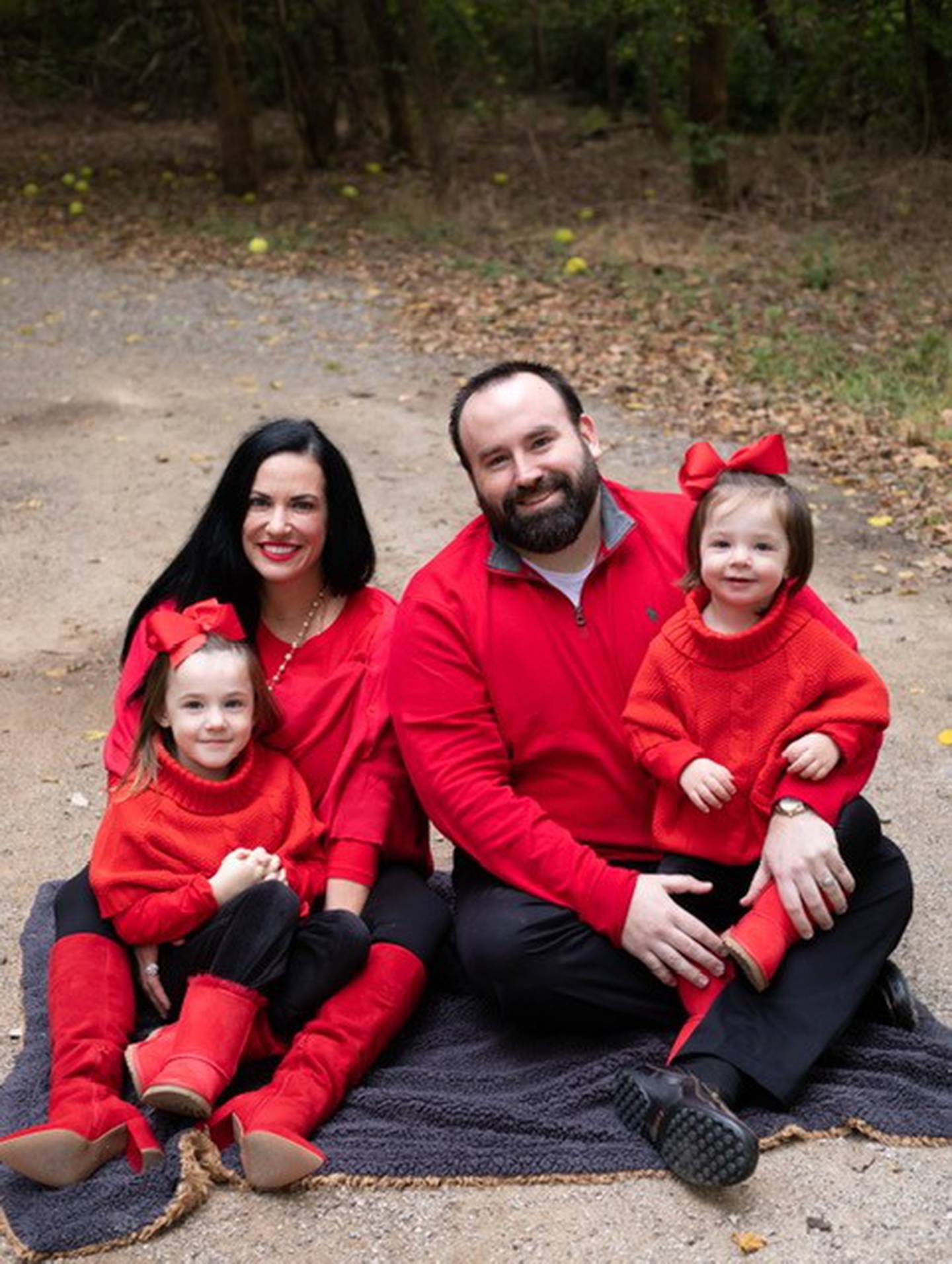 Taylor and Tanner Richards with daughters Julia and Lilian. A third daughter, Faith, is on the way.