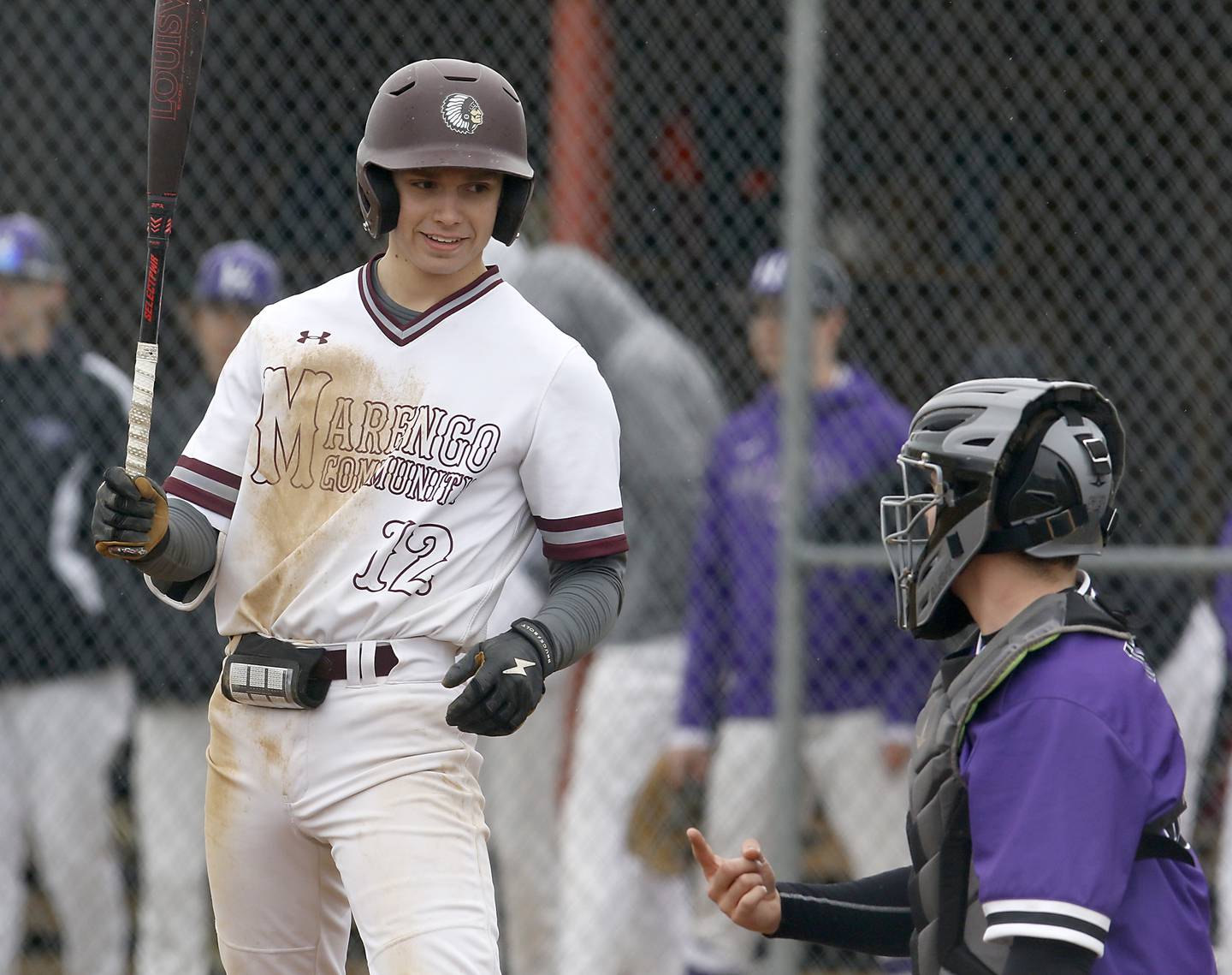 Marengo's Caden Vogt talks with Hampshire's Austin Leonard between pitches during a non-conference baseball game Wednesday, March 30, 2022, between Marengo and Hampshire at Marengo High School.