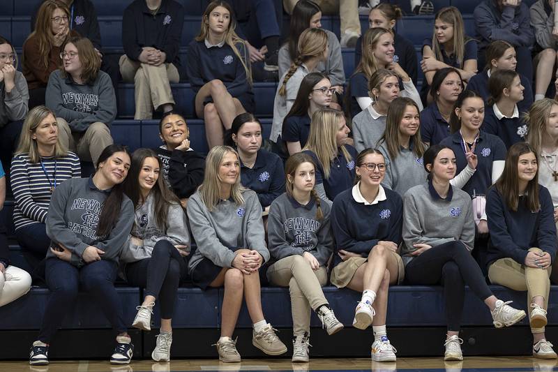 Newman students listen as their classmates perform Thursday, Jan. 30, 2025, during a talent show. NHS held the show in celebration of Catholic Schools Week.