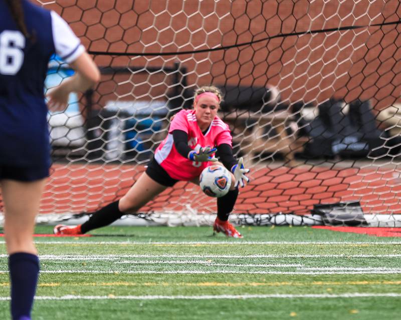 Oswego East's Sam Mcphee (0) makes a save during the Class 3A East Aurora Regional final between Oswego East vs. Oswego. May 20, 2022