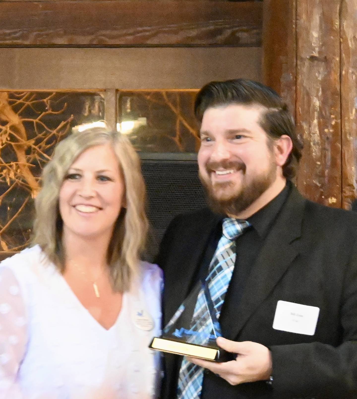 Lissa Olson with IVAC Executive Director Bill Zens after she won the award for 2023 Volunteer of the Year during Thursday nights dinner.