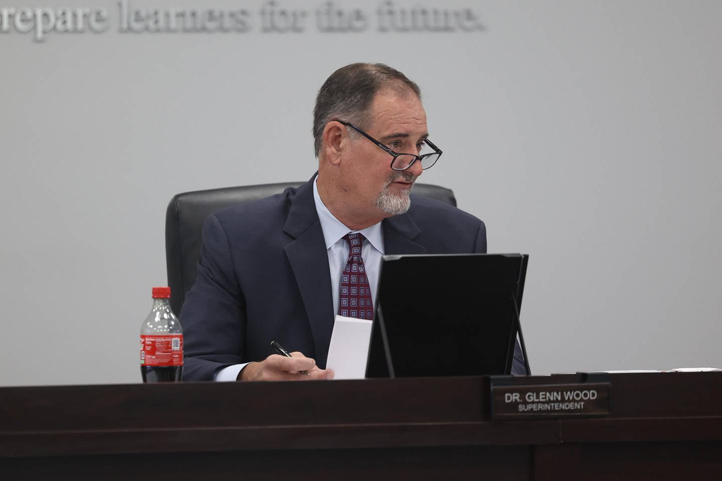 Superintendent Dr. Glenn Wood listens to a board member at the Plainfield School District 202 board meeting on Wednesday, August 28, 2024 in Plainfield.