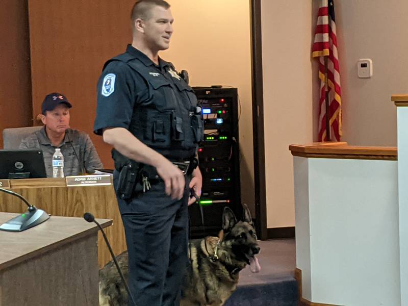 Sandwich Police Department K-9 Officer Keith Rominski and Diesel, the department's first police dog. The Sandwich City Council on July 3 approved an ordinance to retire Diesel because of health problems.