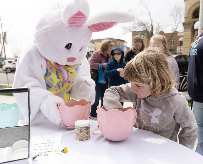 The Easter Bunny helps Leo Thorne, 6, of Ottawa create a special mix of bunny food Saturday, March 30, 2024.