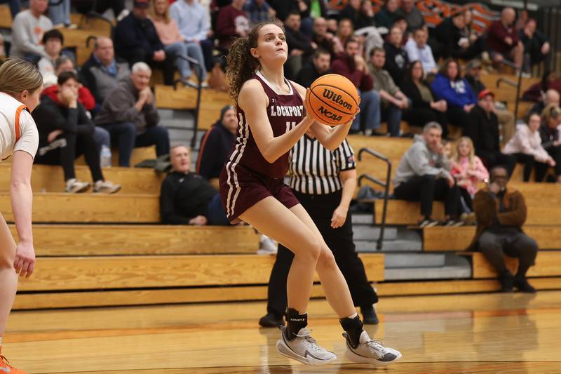 Lockport’s Laura Arstikaitis takes an outside shot against Lincoln-Way West on Tuesday, Feb. 3, 2026 in New Lenox.