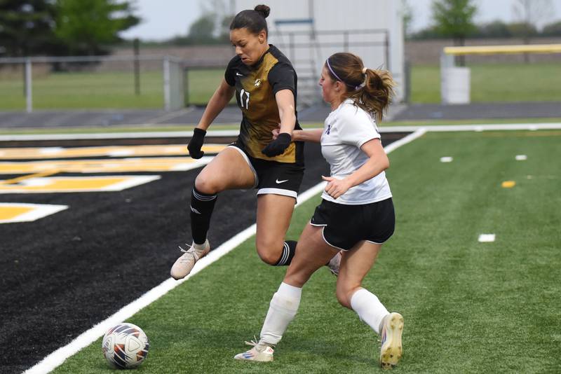Herscher's Leia Haubner, left, jumps to cut off Manteno's Jazmine Wilcoxen during a game at Herscher Tuesday, May 5, 2026.