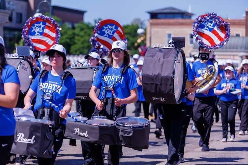 Bill Roth waves to the crowd on the Knights of Columbus float at the Memorial Day parade on Monday, May25,2026 in St. Charles.