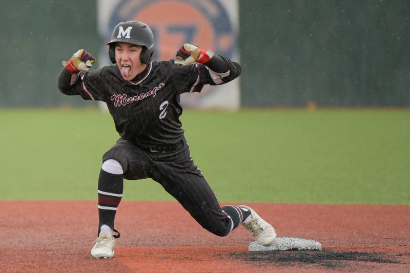 Marengo's Robert Heuser (2) celebrates his double against Streamwood during a game on Monday, March 25, 2024 in Carol Stream.