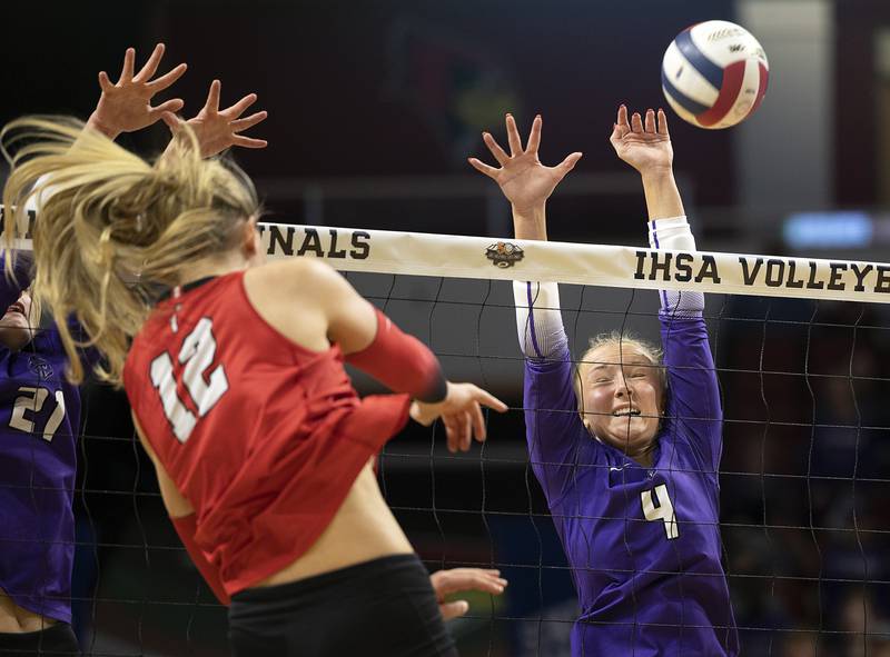 El Paso-Gridley's Taylor Langland goes up for a block against  Timothy Christian's Abby VanderWal Saturday, Nov. 16, 2024, in the Class 2A third place state volleyball match at CEFCU Arena in Normal.