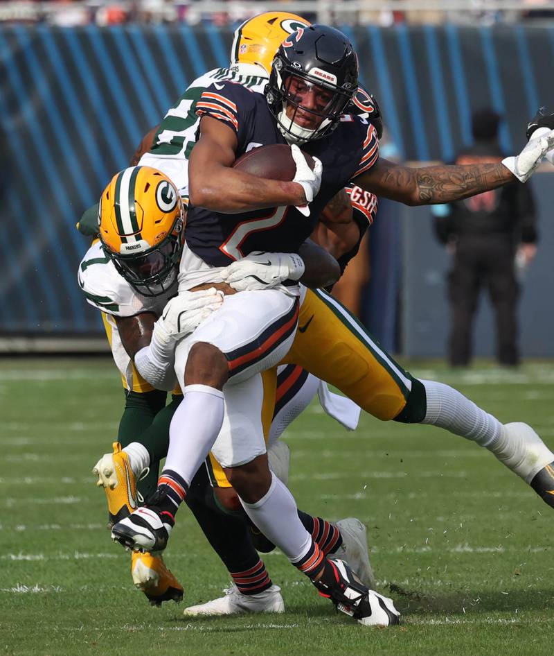Chicago Bears wide receiver DJ Moore pulls away from Green Bay Packers linebacker Quay Walker Sunday, Nov. 17, 2024, during their game at Soldier Field in Chicago.