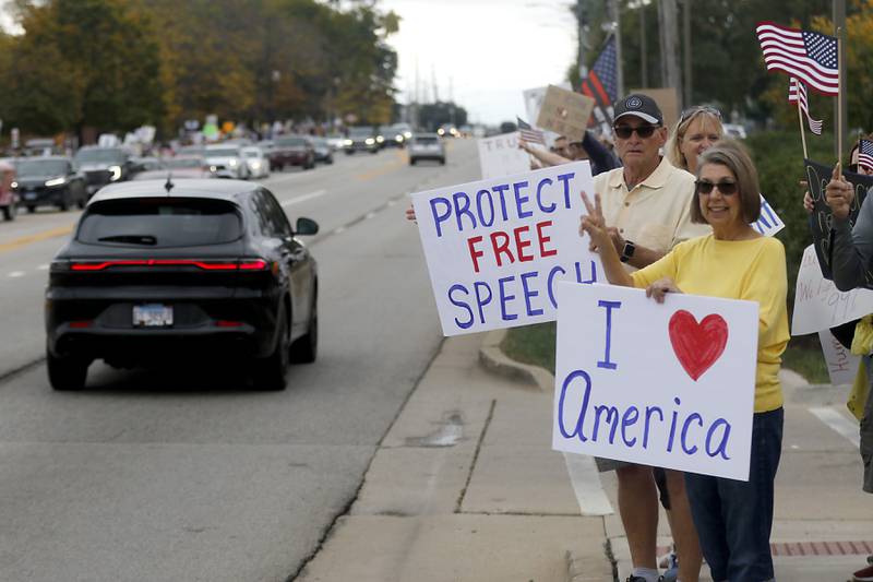 Protesters line Route 31 during a "No Kings” protest rally on Saturday, Oct. 18, 2025, in McHenry. The protest drew thousands of protesters to the area to protest the policies of President Donald Trump.