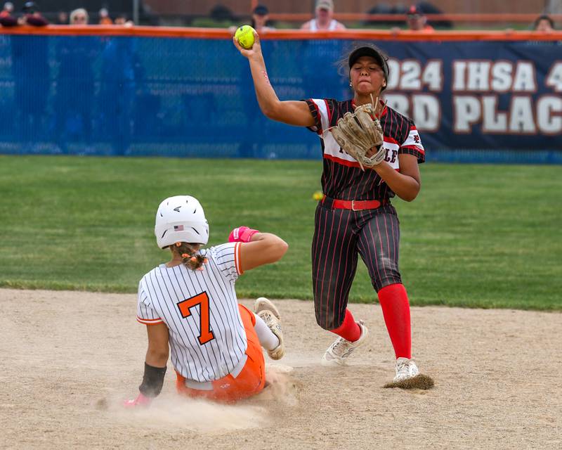 Yorkville's Liv Lathen (5) tries to tour a double play but the throw wasn’t in time to first on Tuesday June 3, 2025, during the sectional semifinal game while taking on Oswego held at Oswego High School.