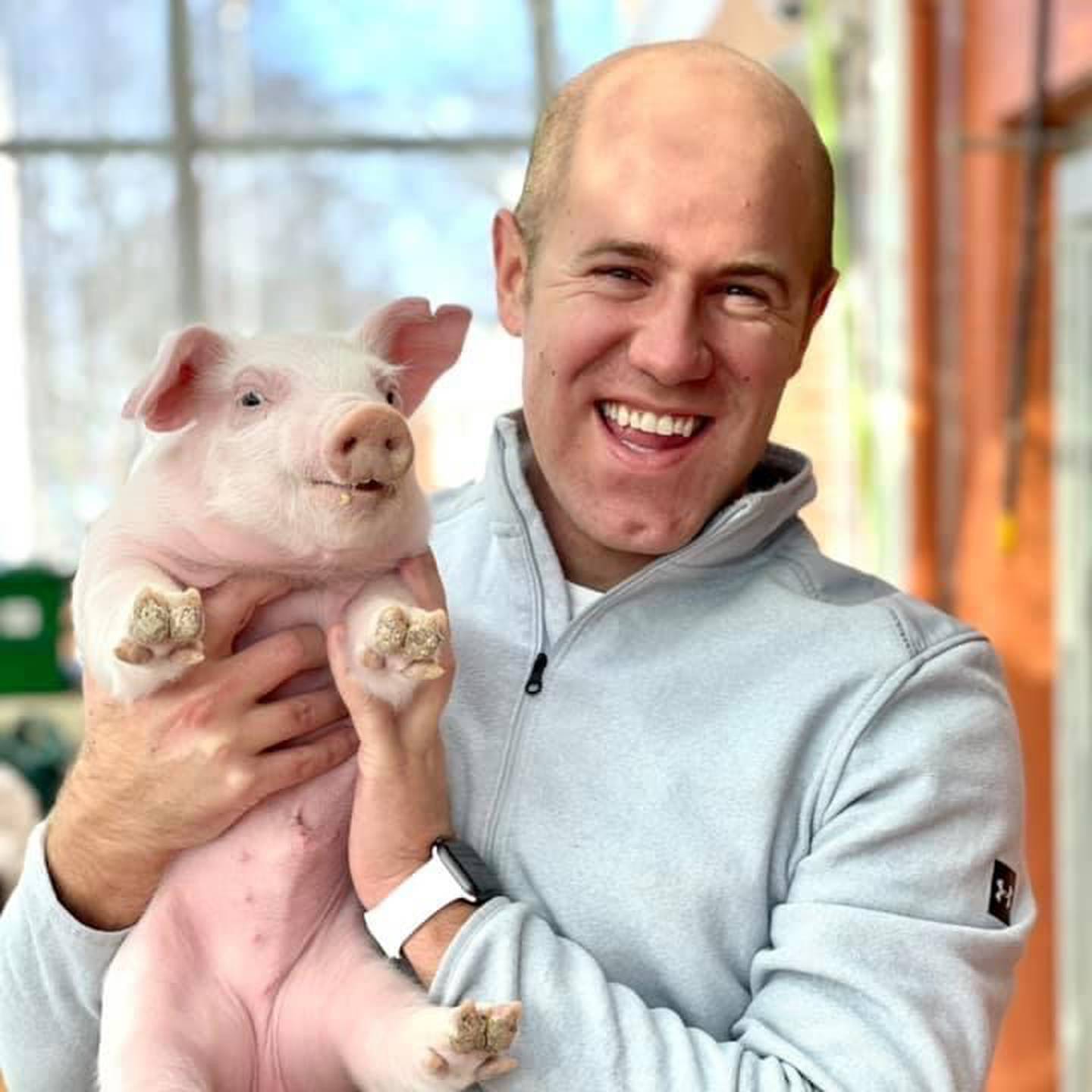 Riley Hintzsche holds a big from Brockman  Farms in Verona. Hintzsche began a project at Streator High School called "Think Oink!", where the school brings in two pregnant pigs and they give birth. The students manage the entire process.