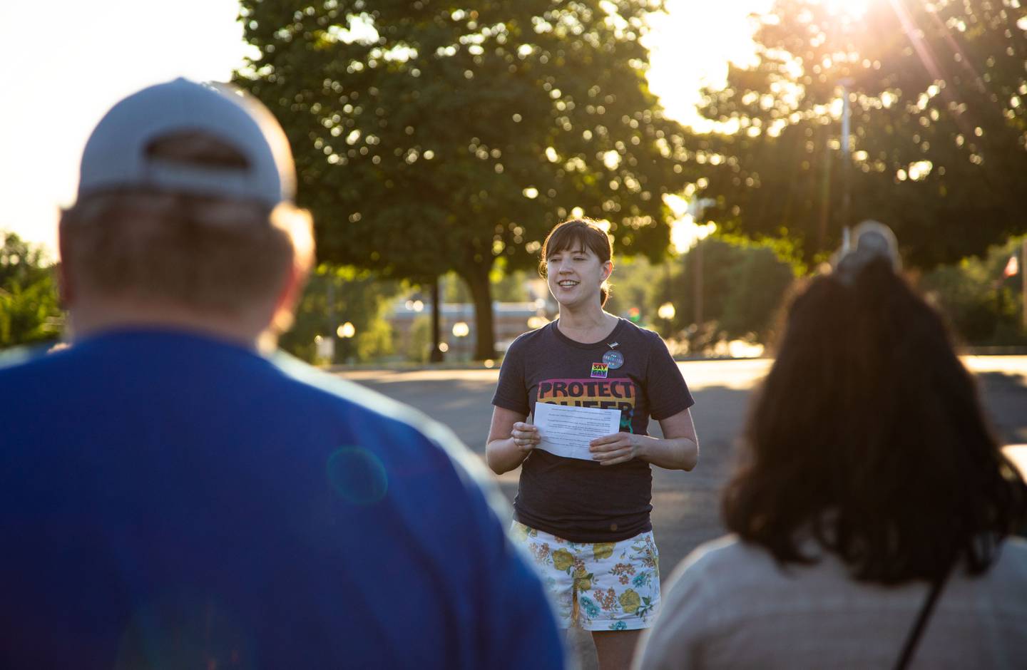 Kylie Peters speaks to the crowd that attended the Pride Fire Hydrant Rally at the northwest corner of Kirk Road and State Street/Rte. 38 in Geneva on Tuesday, Aug. 9, 2022.