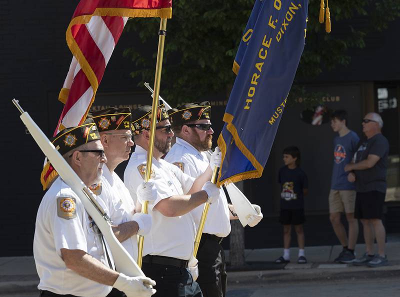 The Dixon VFW color guard marches through the downtown Monday, May 25, 2026, on their way to Oakwood Cemetery for the Memorial Day ceremony.