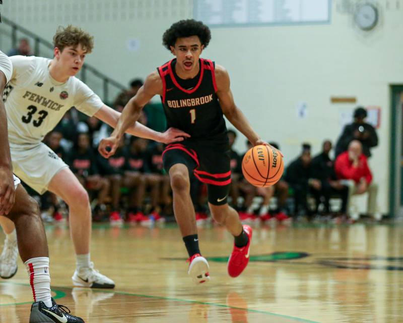Bolingbrook's Braden Pettigrew (1) drives past the defense during their Jack Tosh Holiday Classic basketball tournament Championship game between Fenwick at Bolingbrook. Tuesday Dec 31, 2024 in Elmhurst.