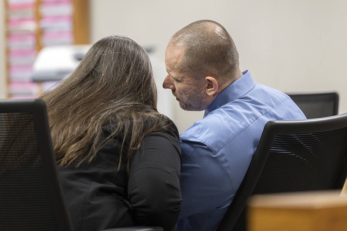Steven W. Coleman speaks with his attorney, Dana McCormick, on Tuesday, July 16, 2024, during his first-degree murder trial in connection with a fatal fire at the Western Apartments in June 2020 in Sterling.